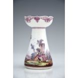 A Vincennes porcelain candlestick, 1745-50, conical hyacinth vase form with ogee rim, the body