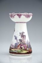 A Vincennes porcelain candlestick, 1745-50, conical hyacinth vase form with ogee rim, the body