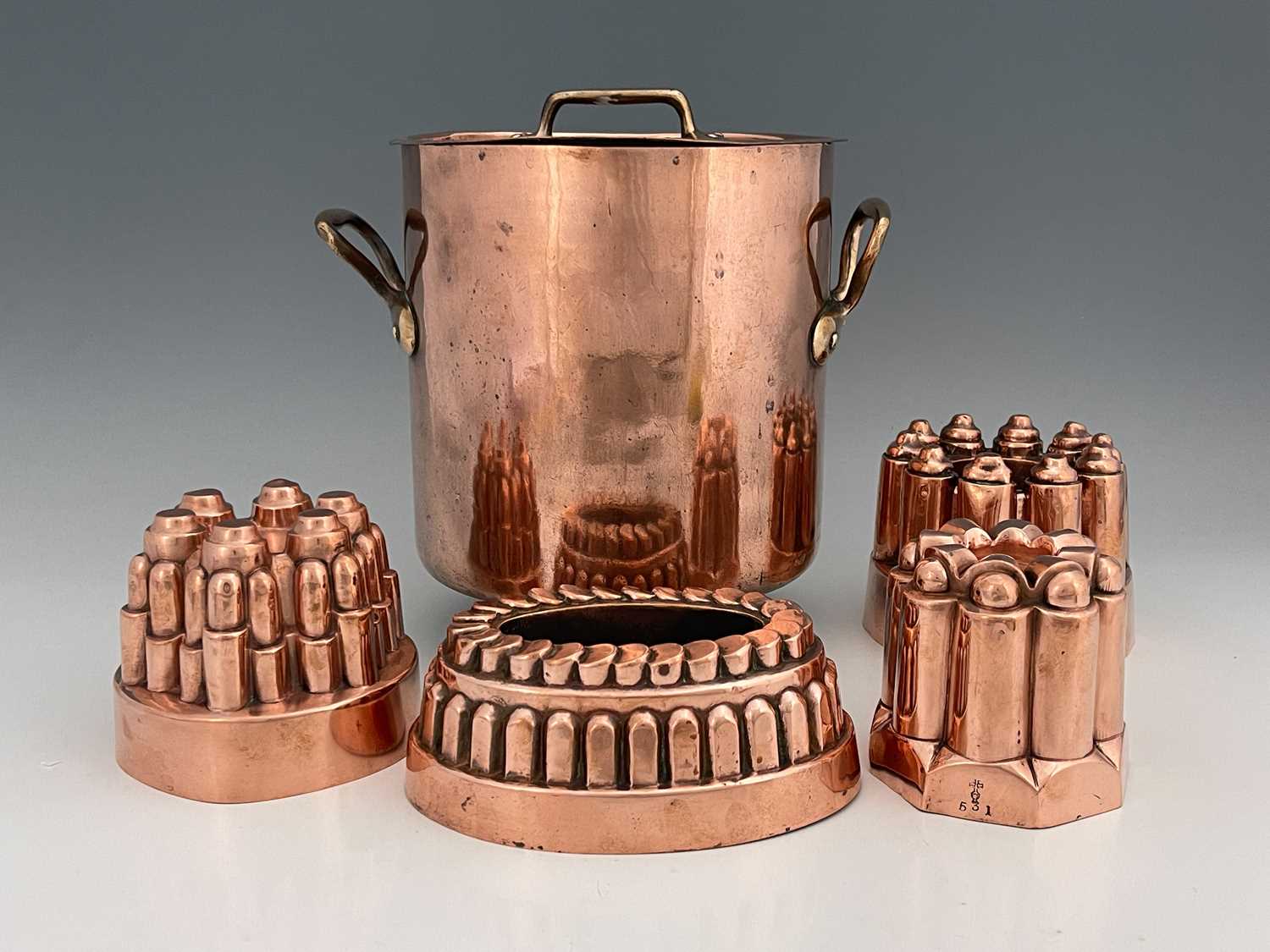 Kitchenalia, four Victorian copper jelly moulds by Benham & Froud, Nos.531, 295, 615, and 331, orb
