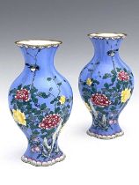 A pair of Chinese famille rose enamelled metal vases, lobed baluster form, painted with naturalistic