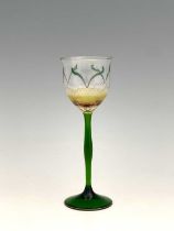 Theresienthal, a Jugendstil enamelled floral wine glass, circa 1900, the optic ribbed ogee tulip