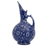 An Aesthetic Movement blue and white jug, Keeling and Co., in the style of Christopher Dresser,