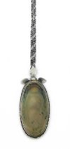 An Arts and Crafts Ruskin silver mounted cabochon pendant, the oval crystalline cabochon within a