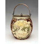 Ada Fimister for Doulton Lambeth, a faience painted biscuit barrel, circa 1882, decorated with three