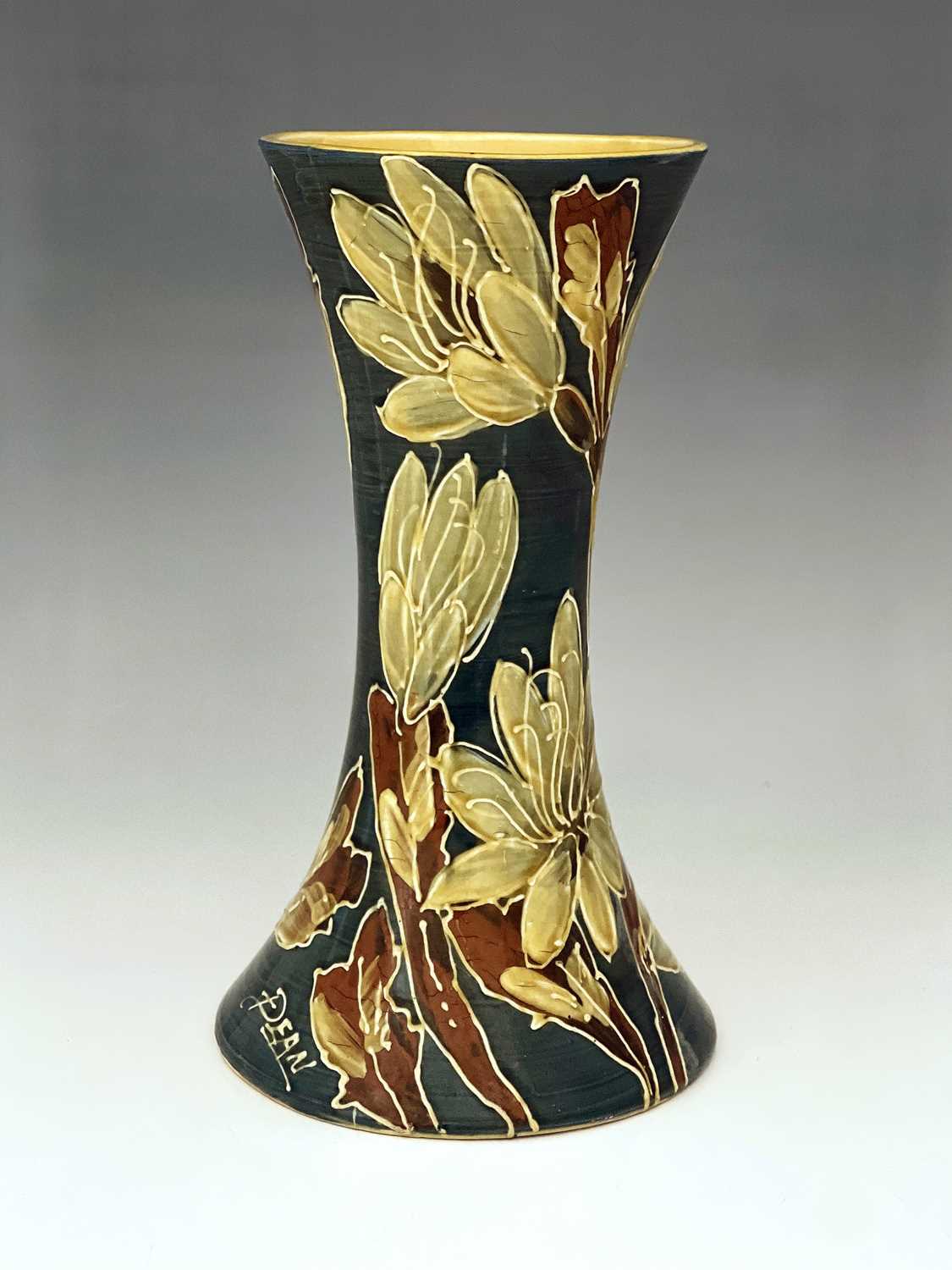 Dean for Thomas Forester and Sons, an Art Pottery slip decorated vase, circa 1910, waisted form,