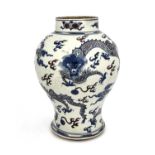 A Chinese vase, Kangxi period, 1662-1722, of baluster form, boldly decorated in underglaze blue