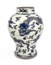 A Chinese vase, Kangxi period, 1662-1722, of baluster form, boldly decorated in underglaze blue