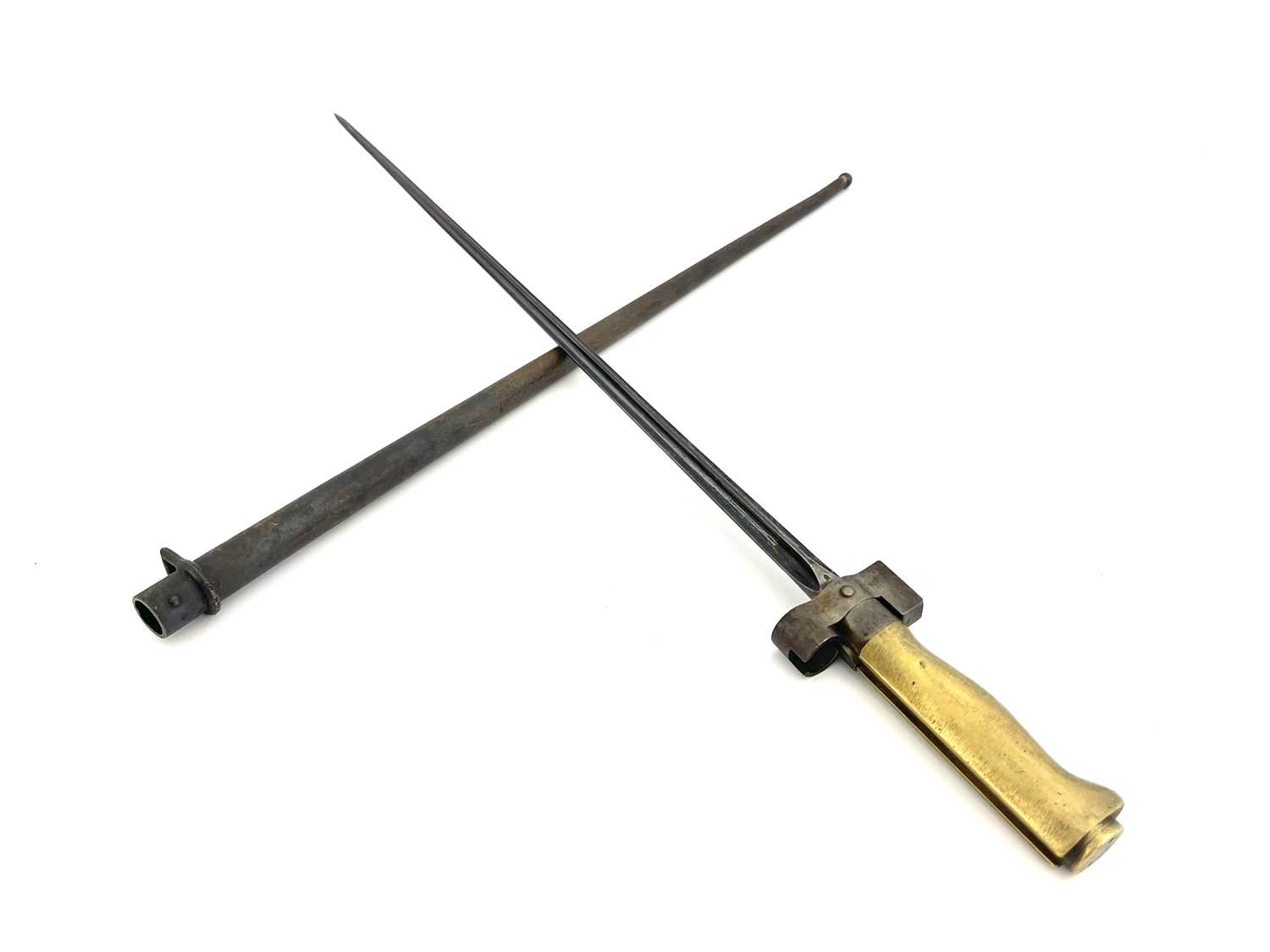 A French M1886 Lebel modified sword bayonet, cruciform blade, brass grip, quillon removed, housed in