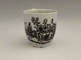 An English porcelain coffee cup, Liverpool printed in black and white by Sadler, circa 1770, with