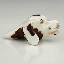 A Staffordshire porcelain novelty dog whistle, 19th century, modelled in the form of a spaniel's