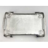 Archibald Knox for Liberty & Co, a Tudric pewter tray, circa 1905, with integral handles,