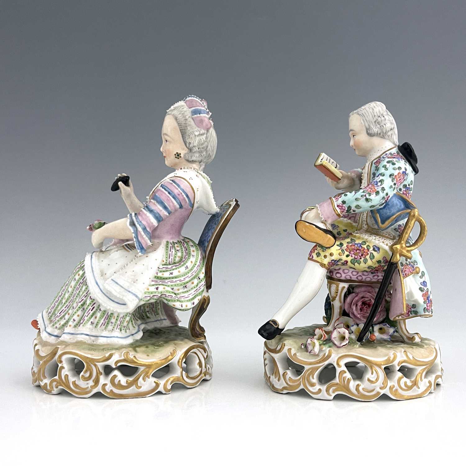 A pair of Meissen type figures, probably late 18th century, model 137, modelled as a seated woman - Image 3 of 6