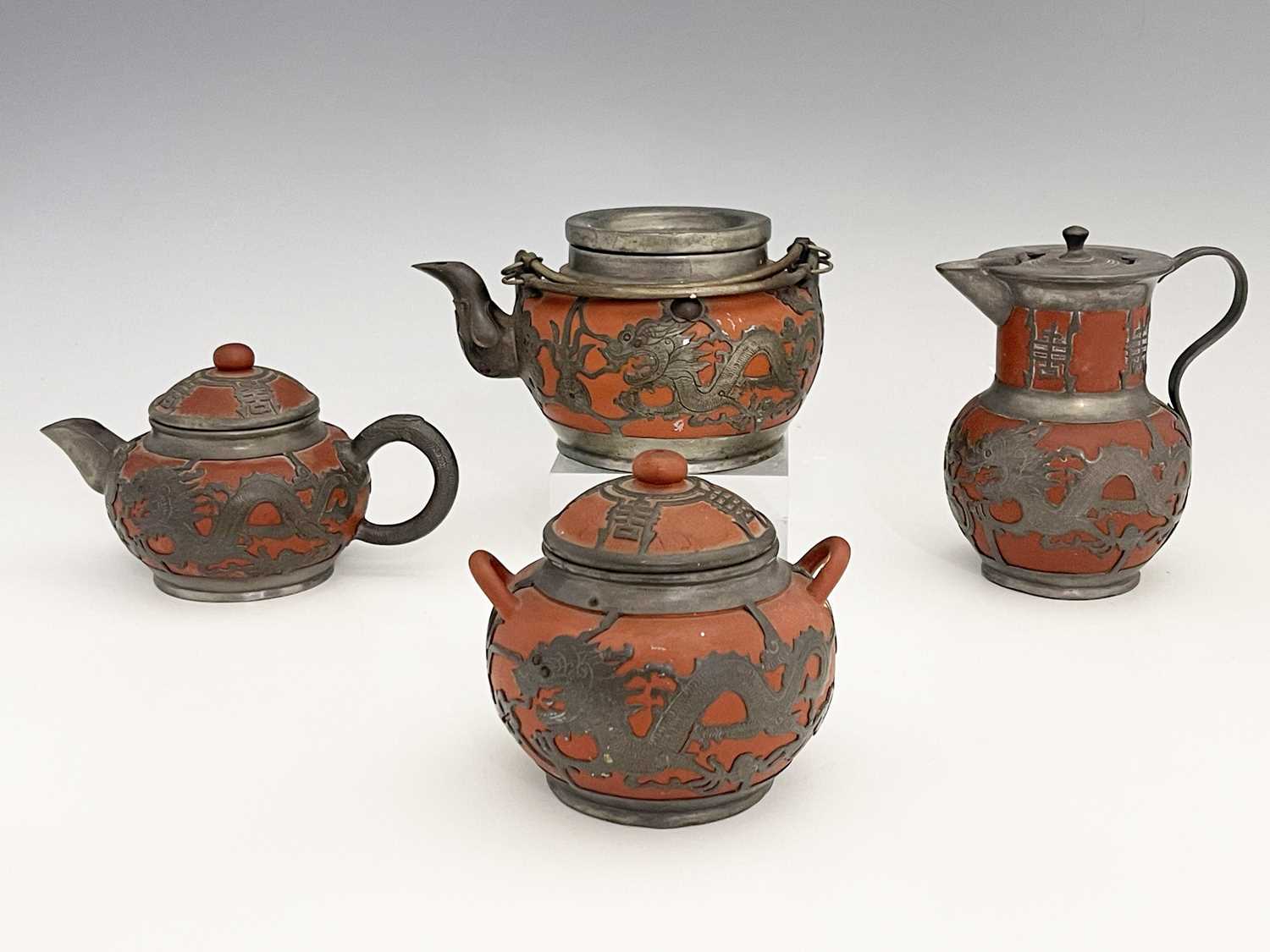 A Chinese Yixing four piece tea set, pewter overlaid redware, chased dragon design below Chinese - Image 2 of 8