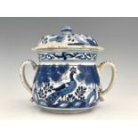 A William and Mary Bristol Delft posset pot and cover, circa 1690, twin handled squat baluster form,