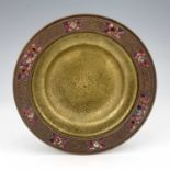 Louis Comfort Tiffany, an Art Nouveau enamelled mixed metal Favrille dish, the shallow ogee bowl