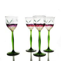 Theresienthal, a set of four Jugendstil enamelled floral wine glasses, circa 1900, the vertically