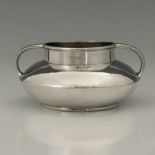 An Arts and Crafts silver twin handled bowl, Henry Hobson and Sons, Birmingham 1909, squat ovoid