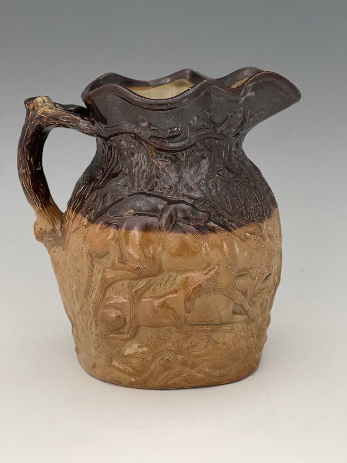 A Doulton and Watts relief moulded stoneware hunting jug, modelled to each side with dogs - Image 5 of 8