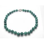 A malachite bead necklace