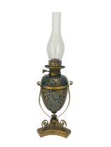Mark V Marshall for Doulton Lambeth, a stoneware and brass oil lamp, egg form, carved in relief with