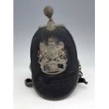 A Victorian First Sussex Artillery Volunteers helmet, ball finial, with helmet plate incorporating