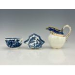 Three items of Caughley, including a small helmet cream jug, double ogee form, in the FitzHugh