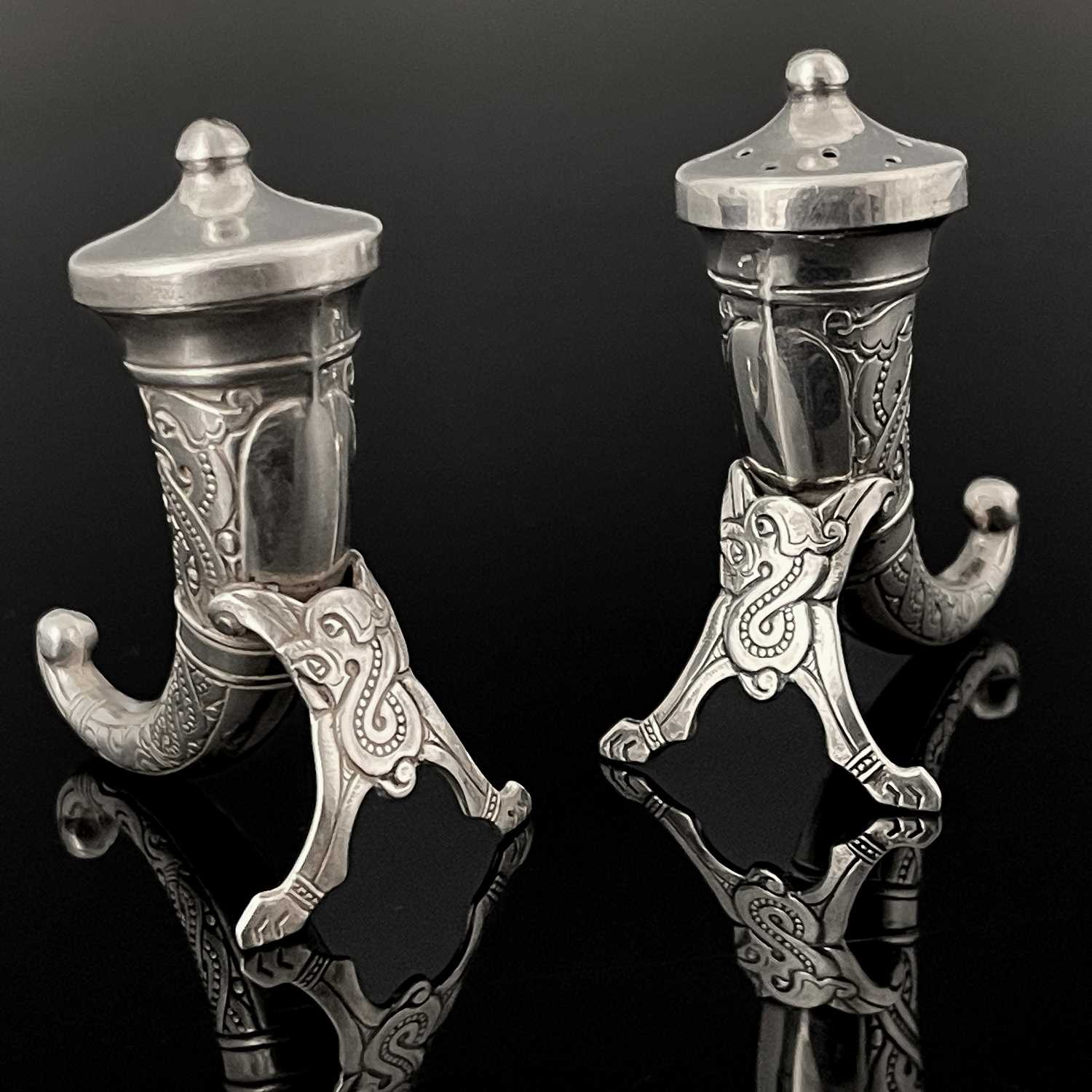 A pair of Norwegian Dragestil silver salt and pepper pots, Magnus Aase, Bergen circa 1920s, modelled