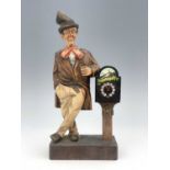 A Black Forest 'whistling' automaton, early 20th Century, in the manner of Karl Griesbaum, in the