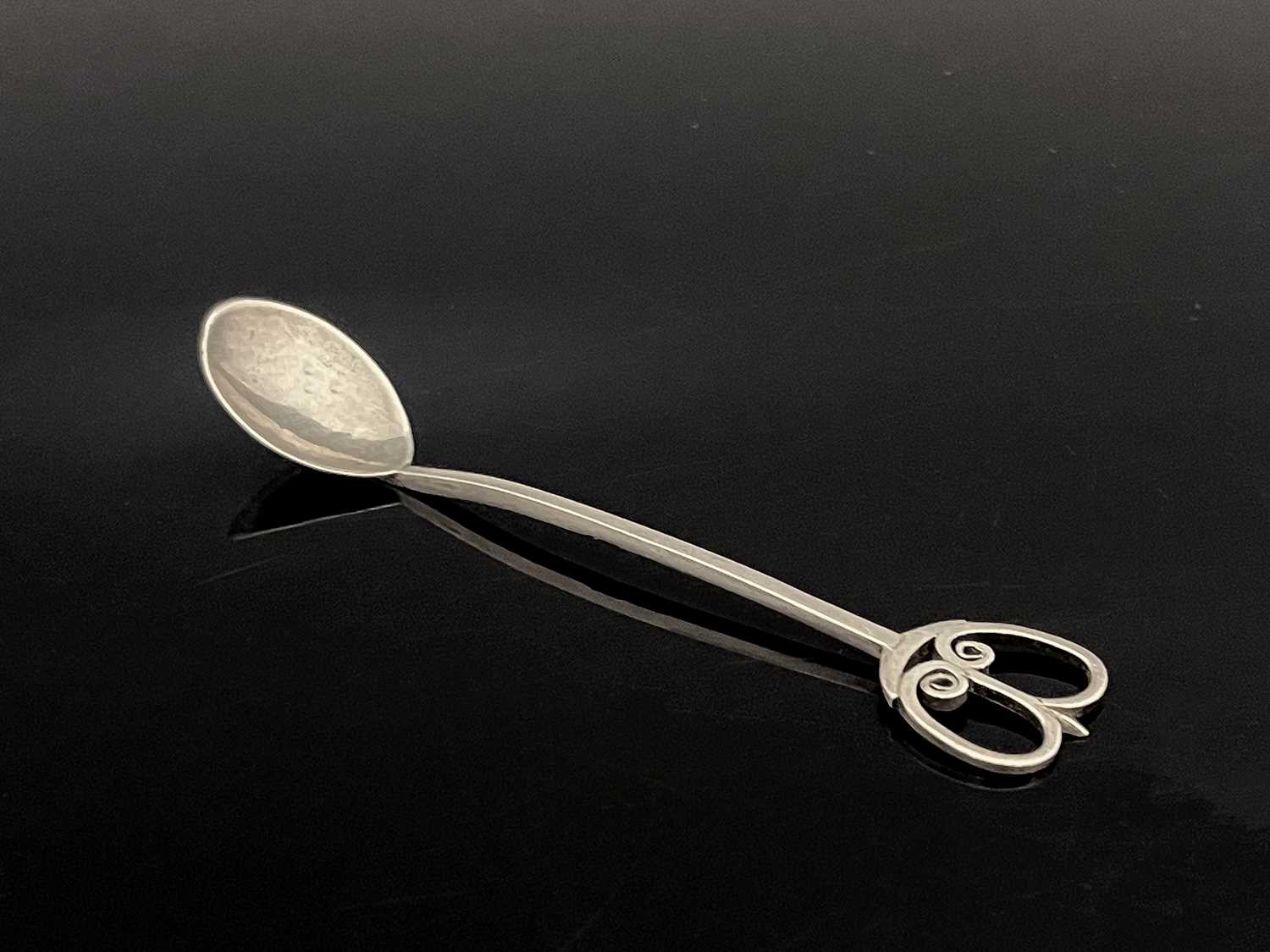 A Scottish Arts and Crafts silver spoon, Bernard Harrington, Edinburgh 1959, the planished bowl on a