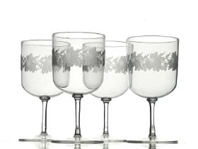 A set of four Arts and Crafts wine glasses, probably John Walsh Walsh circa 1900, the cylindrical