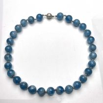 An aquamarine bead necklace, with silver clasp