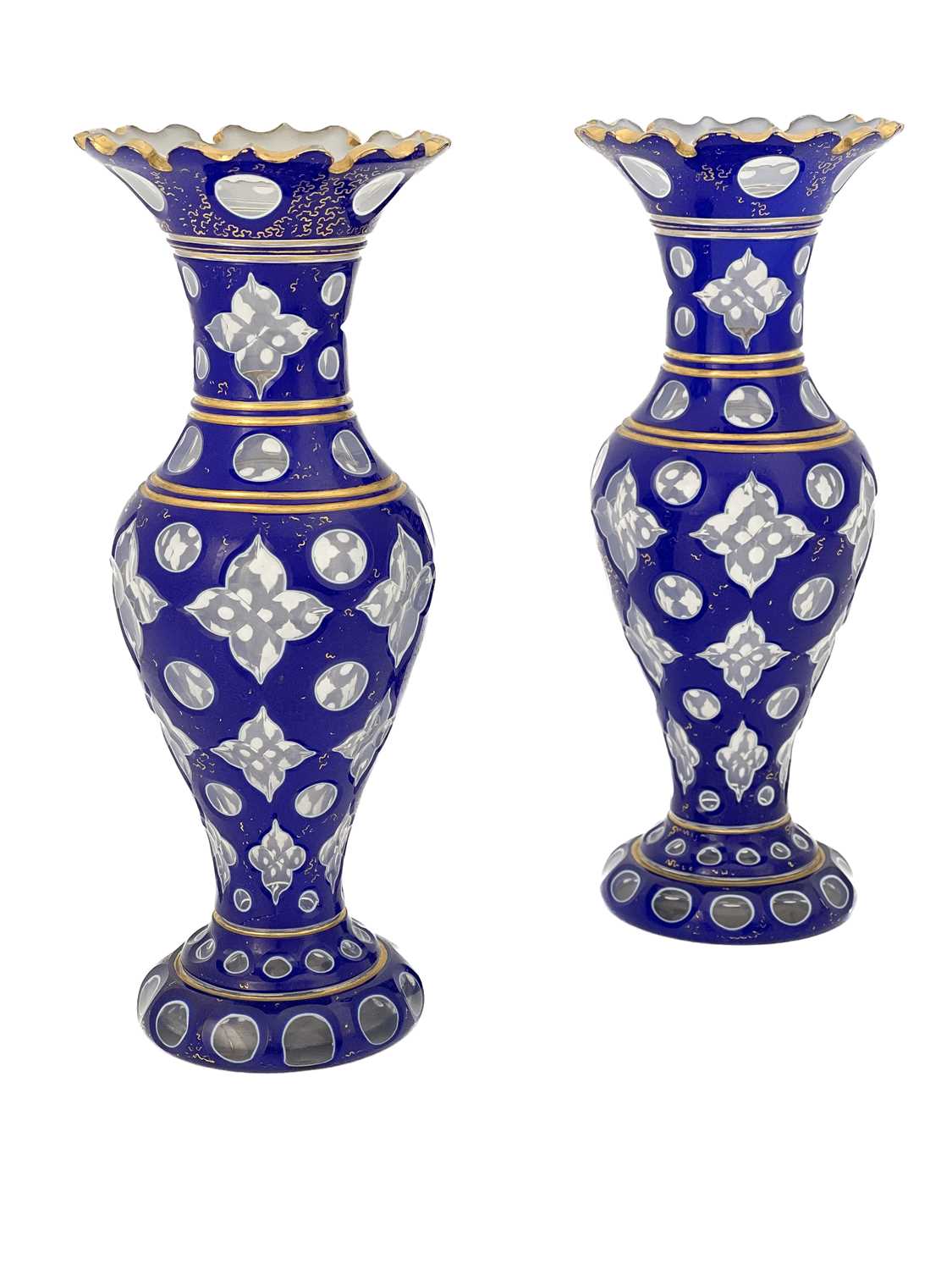 A pair of Bohemian cased and cut glass vases, 19th century, inverse baluster form, decorated with