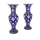 A pair of Bohemian cased and cut glass vases, 19th century, inverse baluster form, decorated with