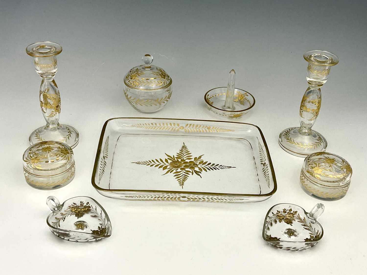 A Bohemian gilt engraved glass dressing table set, probably Moser circa 1900, including tray,