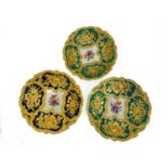 Three 19th century Meissen relief moulded dishes, each with floral cartouches around a central