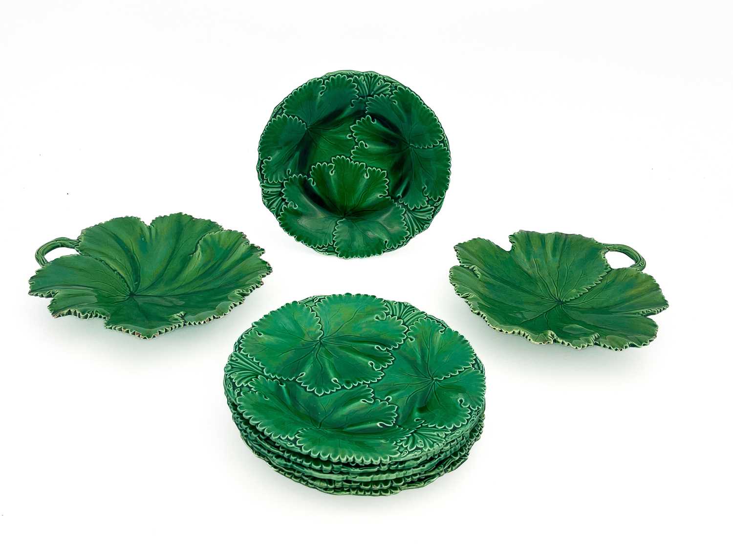 A Victorian Copeland and Garrett majolica dessert service, circa 1870s, six leaf moulded plates