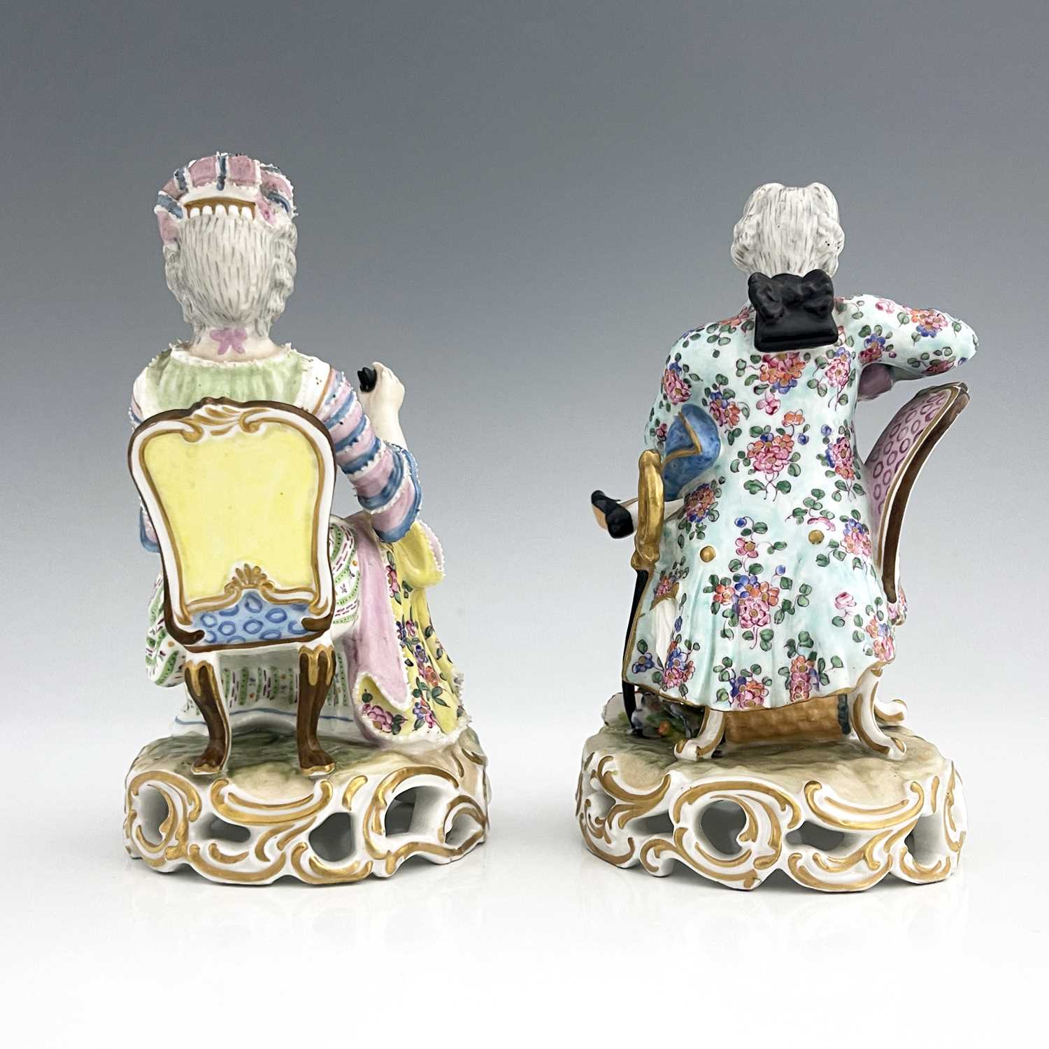 A pair of Meissen type figures, probably late 18th century, model 137, modelled as a seated woman - Image 4 of 6