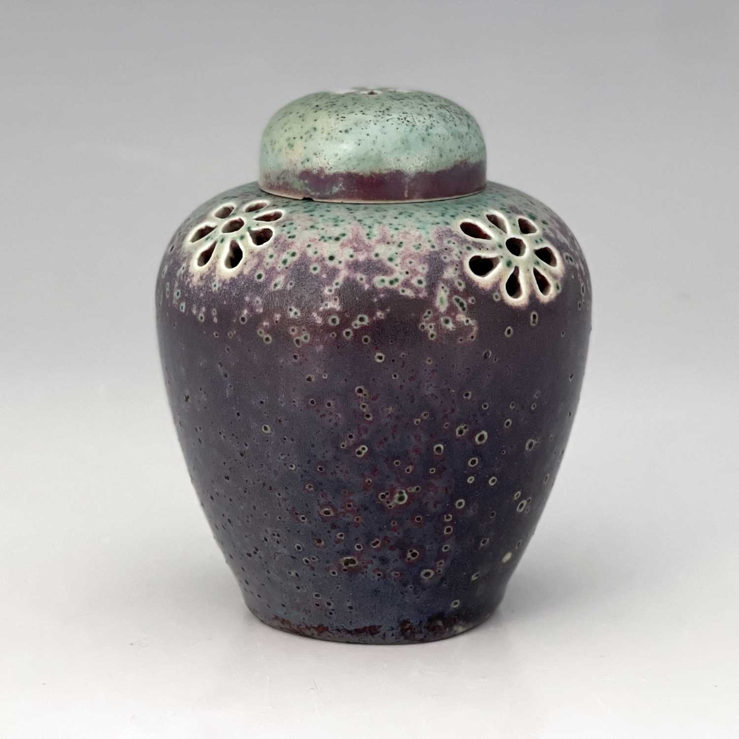 Ruskin Pottery, a small High Fired reticulated ginger jar and cover, circa 1905, pierced with six