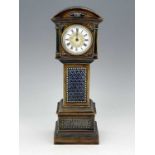 A Doulton stoneware novelty time piece, 1884, modelled as a longcase clock, moulded foliate panels