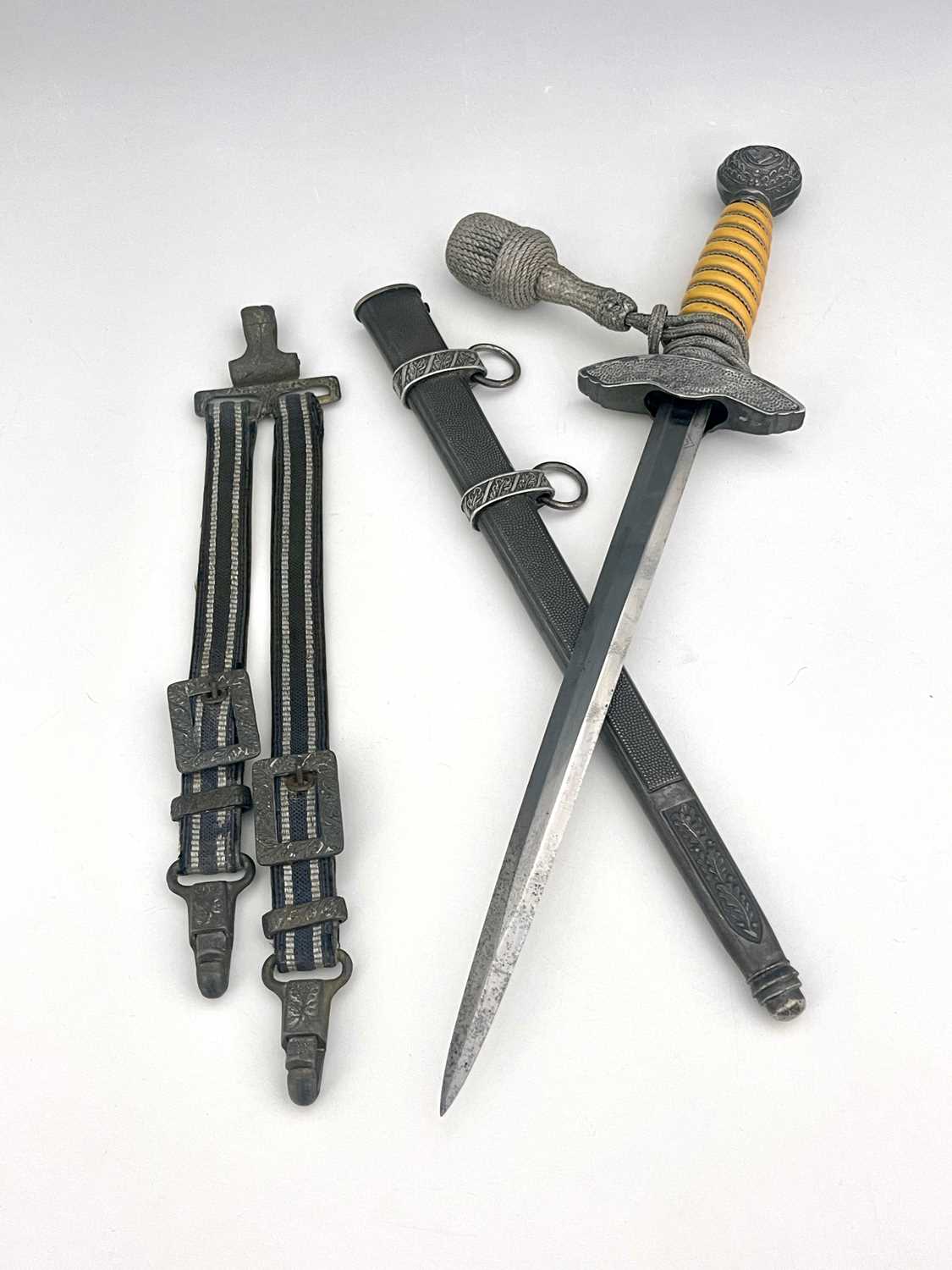 A German Third Reich Luftwaffe dagger, 2nd Model, wire bound orange plastic grip, eagle