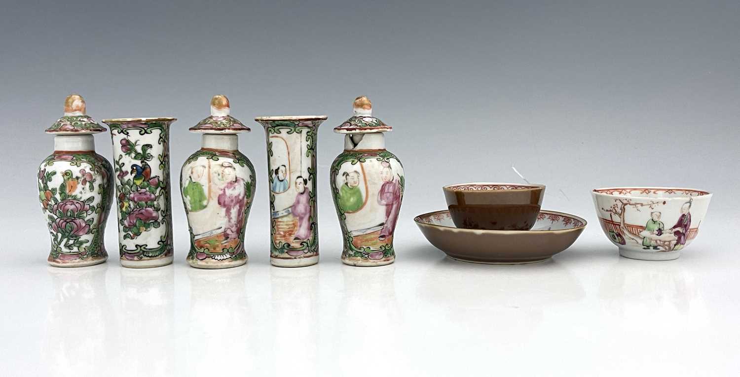 Chinese famille rose ceramics including a miniature altar garniture of five vases, in the Canton