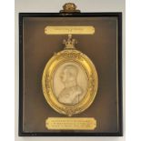 Royal Interest, a pair of porcelain profile portrait plaques in high relief, George V, King of