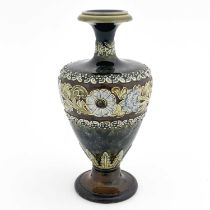 A Royal Doulton stoneware vase, shouldered and footed form, relief moulded floral bands, 18cm high