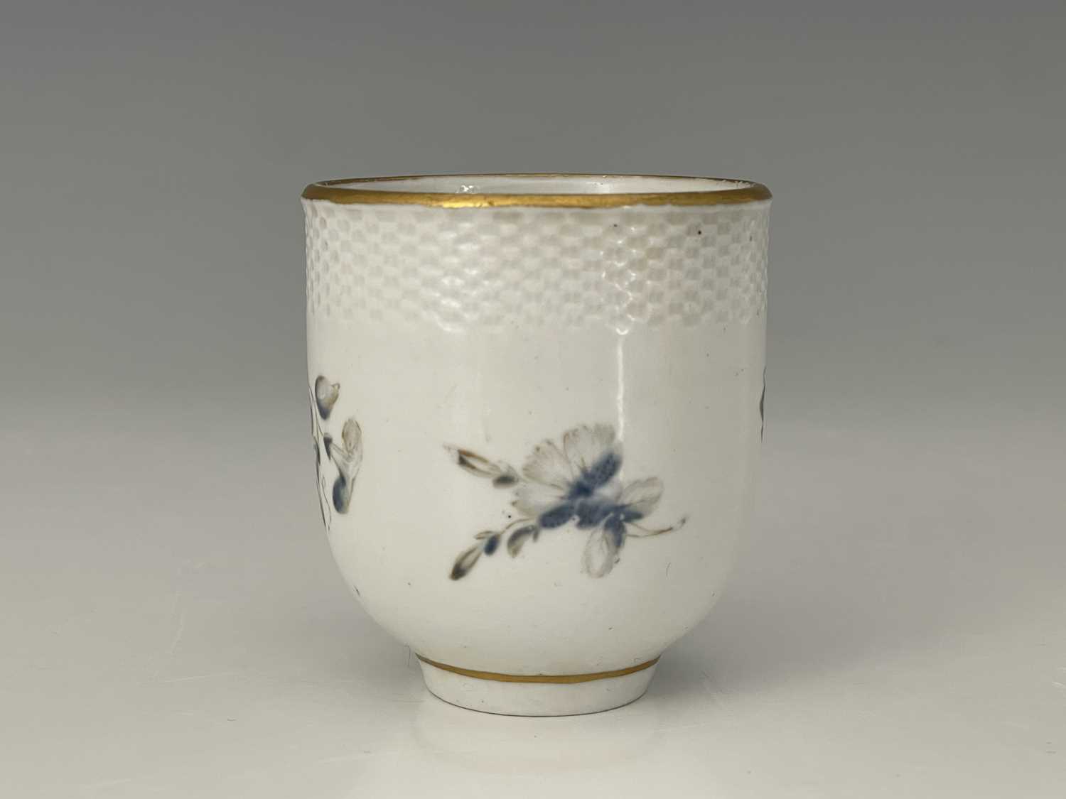A Bristol porcelain coffee cup, cross mark, circa 1770, rattan moulded border above blue - Image 2 of 6