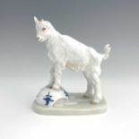 A Meissen figure of a goat on a teacup, model V.107, later 20th century, 14.5cm high