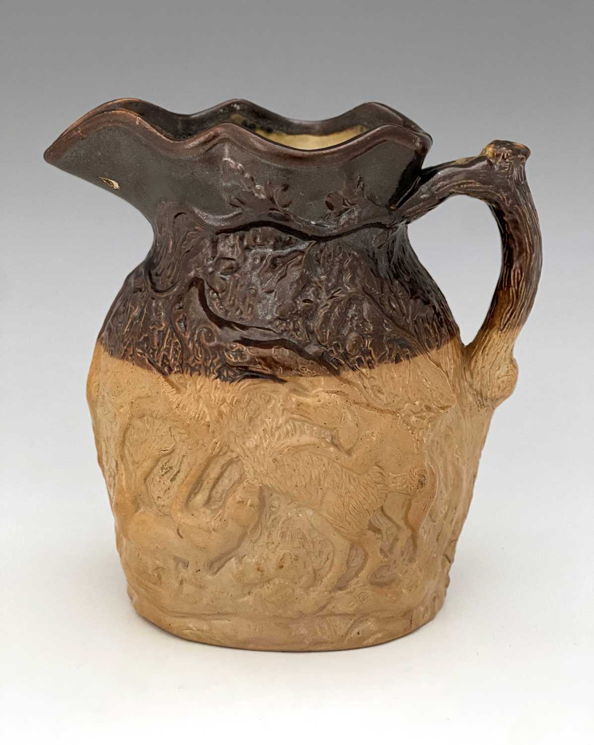 A Doulton and Watts relief moulded stoneware hunting jug, modelled to each side with dogs - Image 6 of 8