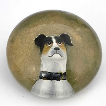 An Essex Crystal type enamelled glass paperweight, circa 1880, carved with the bust of a dog, foil