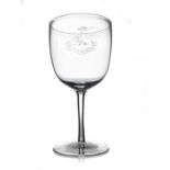 Thomas Webb, an Edwardian crest engraved wine glass, circa 1905, the plain bowl with a crest and
