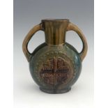 Christopher Dresser for Linthorpe, an Aesthetic Movement art pottery twin handled vase, circa