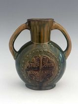 Christopher Dresser for Linthorpe, an Aesthetic Movement art pottery twin handled vase, circa